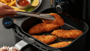 Frozen Tyson Panko Chicken Tenderloins with dips and side dishes on a counter