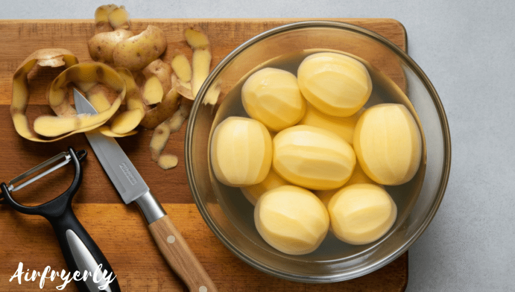 Peeled potatoes cut into chunks and soaked in ice water for fluffier texture before cooking