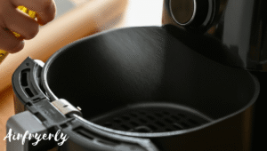 Ore Ida tater tots air fryer basket ready to cook at 400 degrees Fahrenheit