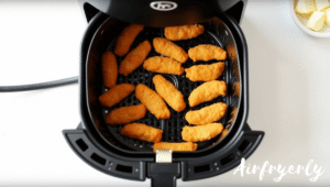 “Tyson Honey Breast Tenders cooking in the air fryer at 390°F, golden and crispy.”